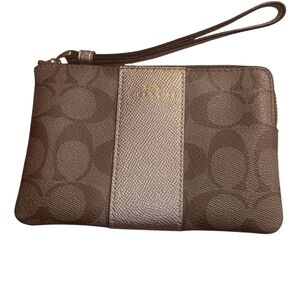 SOLD.  Coach Tan Wristlet Clutch